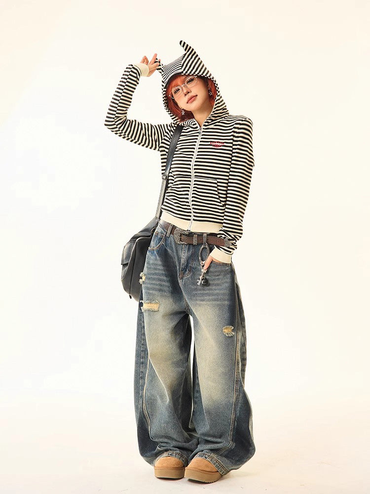 Distressed spray print vintage style denim pants