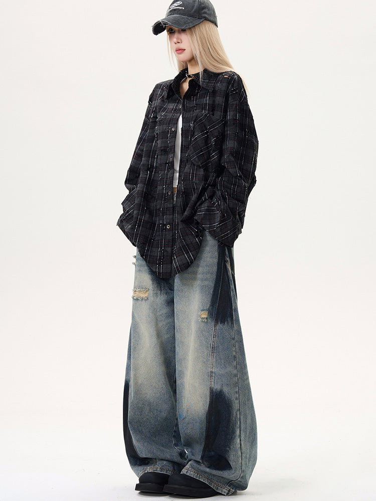 Distressed spray print vintage style denim pants