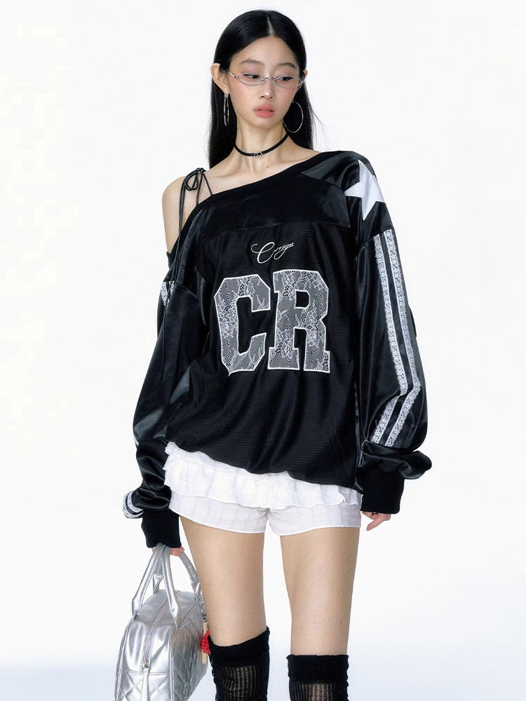 Diagonal off-shoulder embroidered long-sleeve top