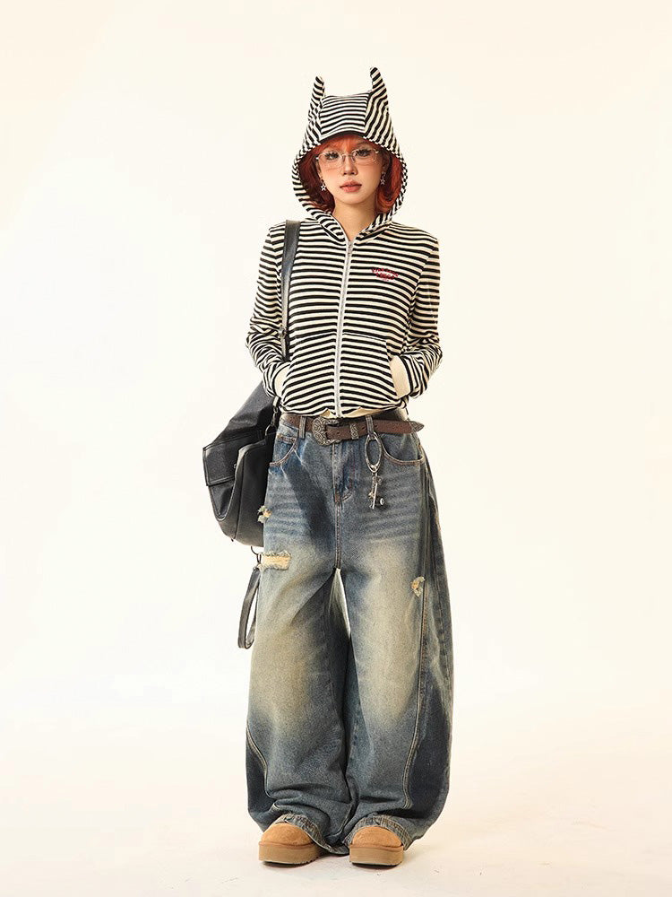 Distressed spray print vintage style denim pants