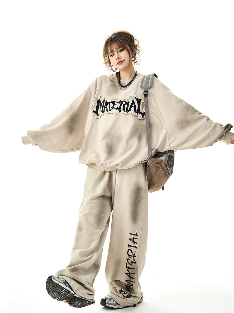 ユニセックス ルーズヴィンテージ刺繍スウェット