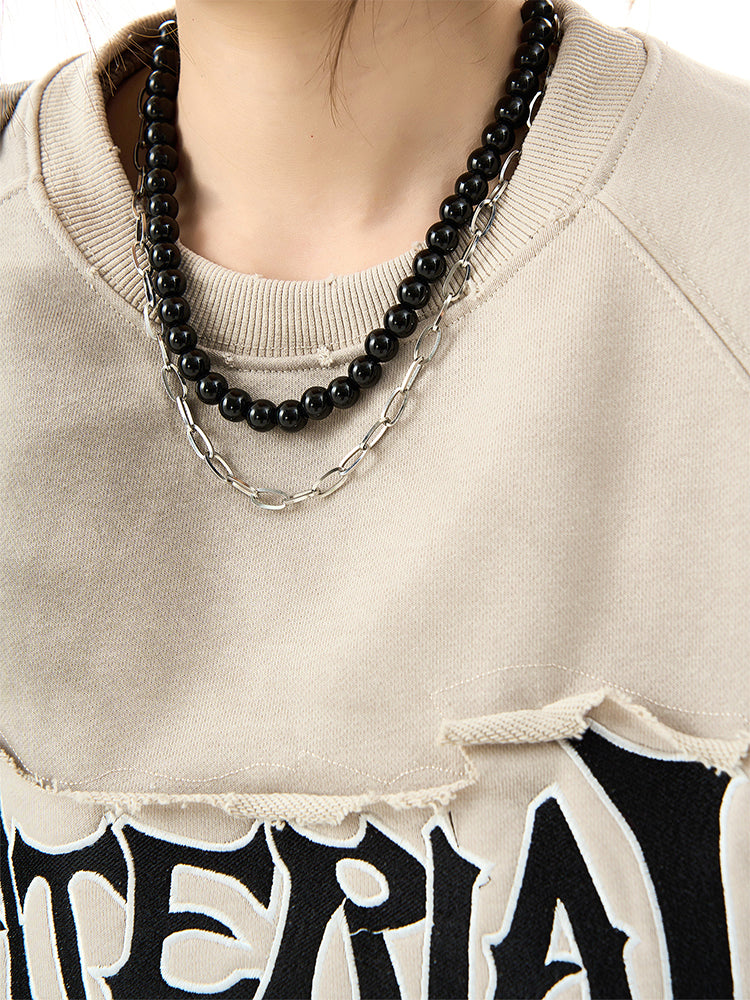 ユニセックス ルーズヴィンテージ刺繍スウェット